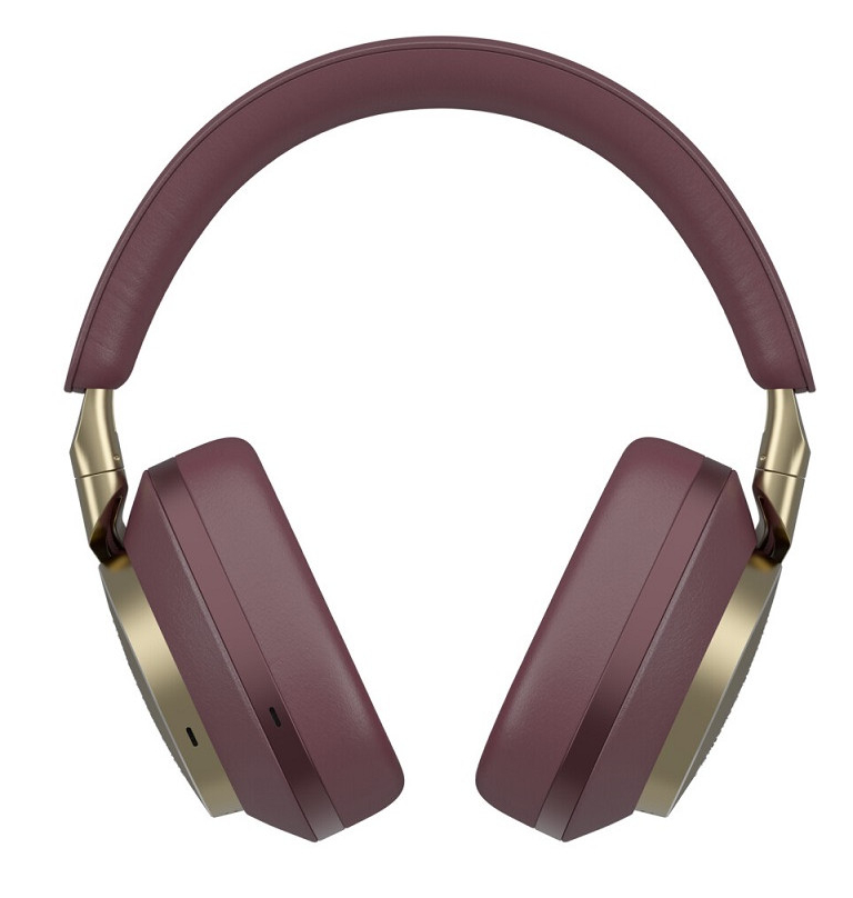 Bordowe słuchawki ze złotymi akcentami, widok z góry.