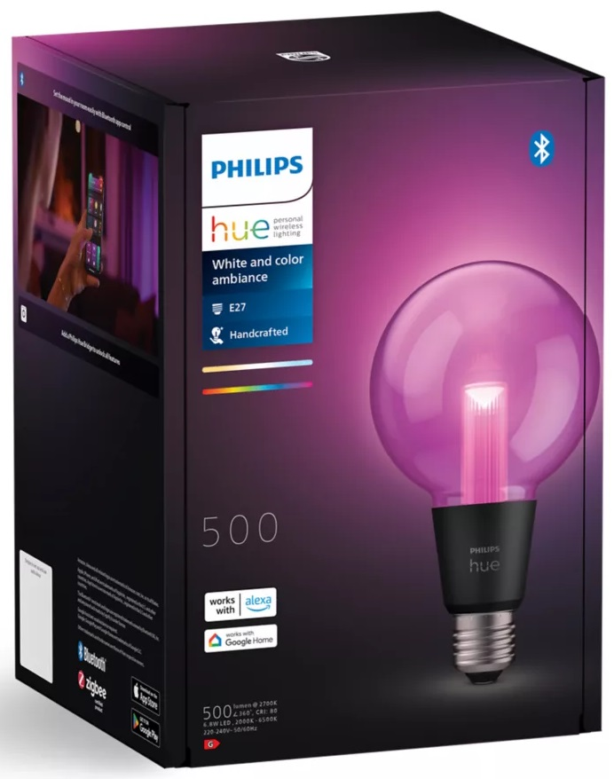 Zapakowana żarówka Philips Hue z różową żarówką. Czarne pudełko i podstawa żarówki.