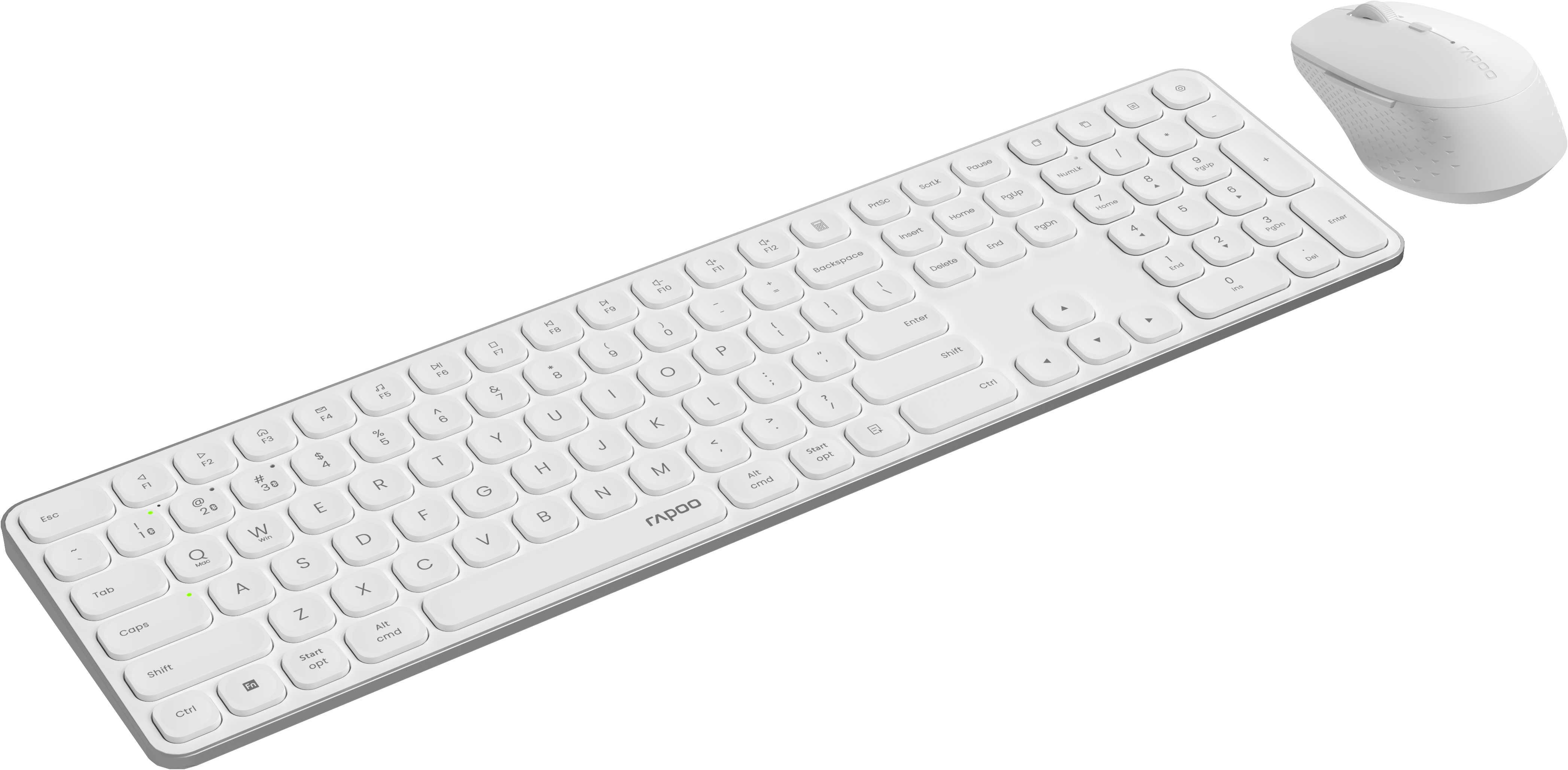 Un ensemble clavier et souris blancs sur fond noir.
