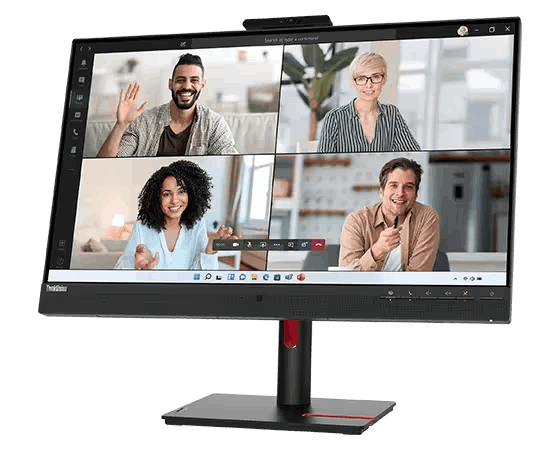 Un monitor de computadora muestra una videollamada con cuatro participantes. Una cámara está en la parte superior del monitor.