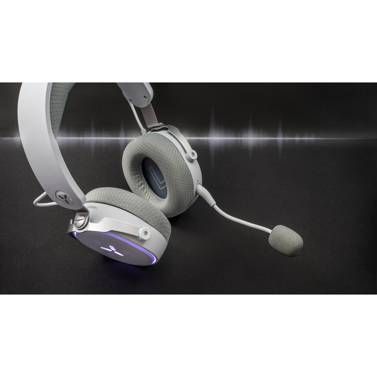 White and gray gaming headset with a flexible microphone. The background is black with sound waves.