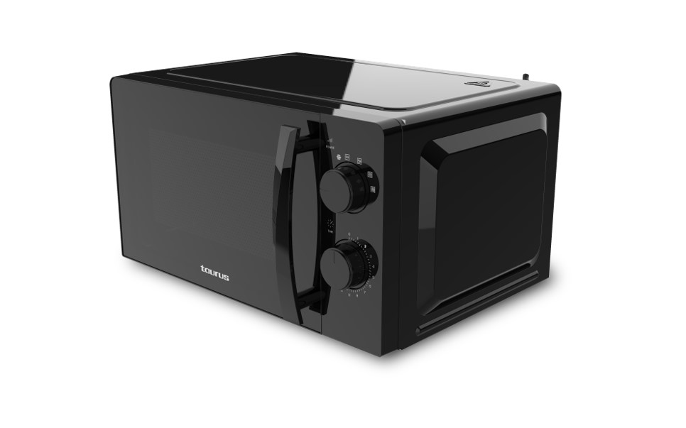 Horno microondas negro con perillas de control sobre una superficie blanca.