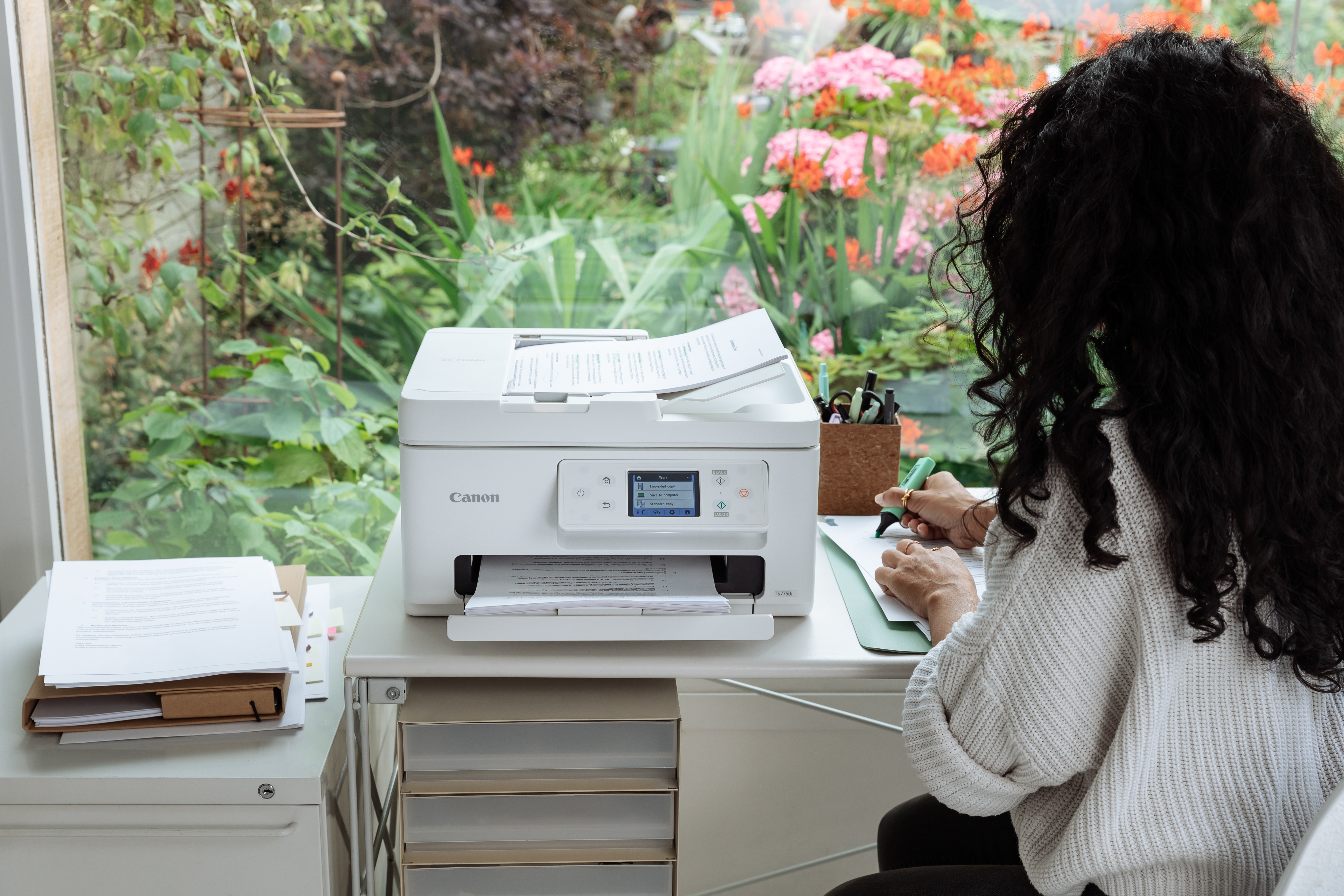 Ein Canon-Drucker mit Pixma Print Plan Logo.