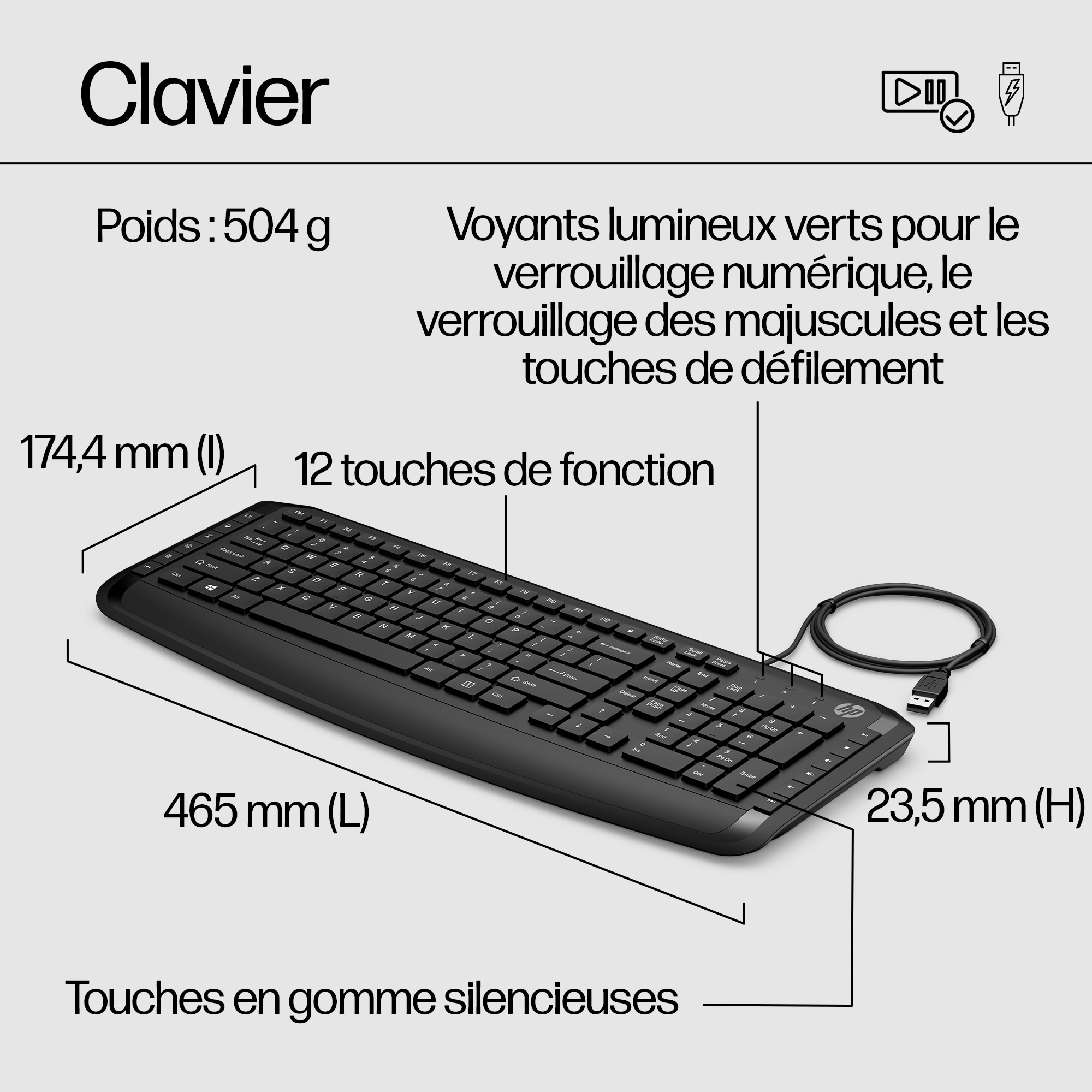 A black keyboard. It has a lot of keys, and a cable is attached to it.