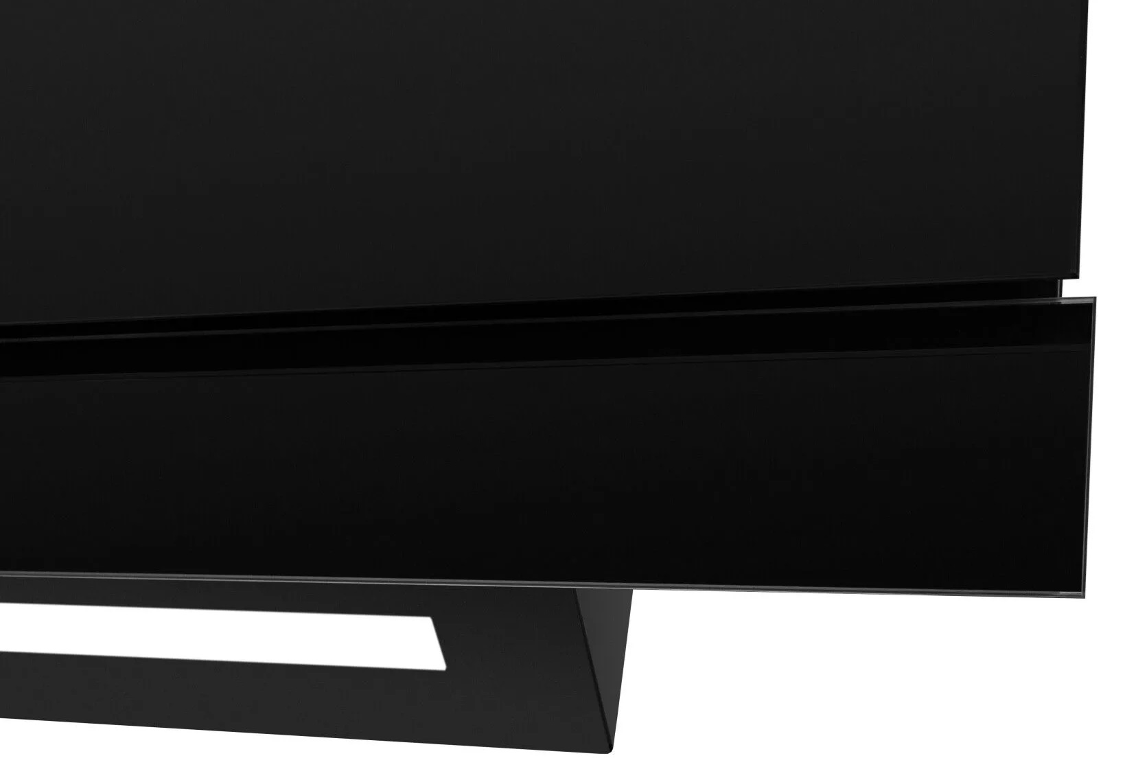 Zbliżenie czarnej, błyszczącej szafki z czarnym metalowym stojakiem. Szafka ma elegancki, nowoczesny design.