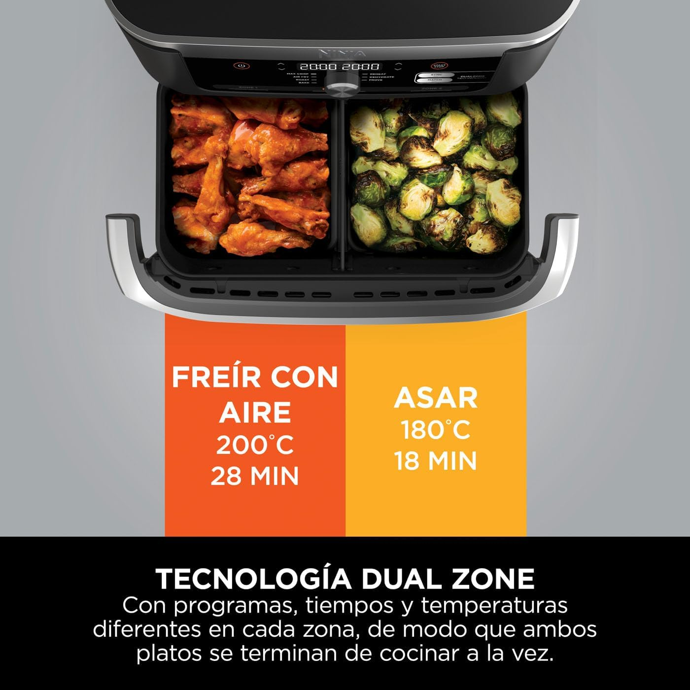 Freidora de aire con dos secciones. Una con alitas de pollo, otra con coles de Bruselas. Instrucciones en español.