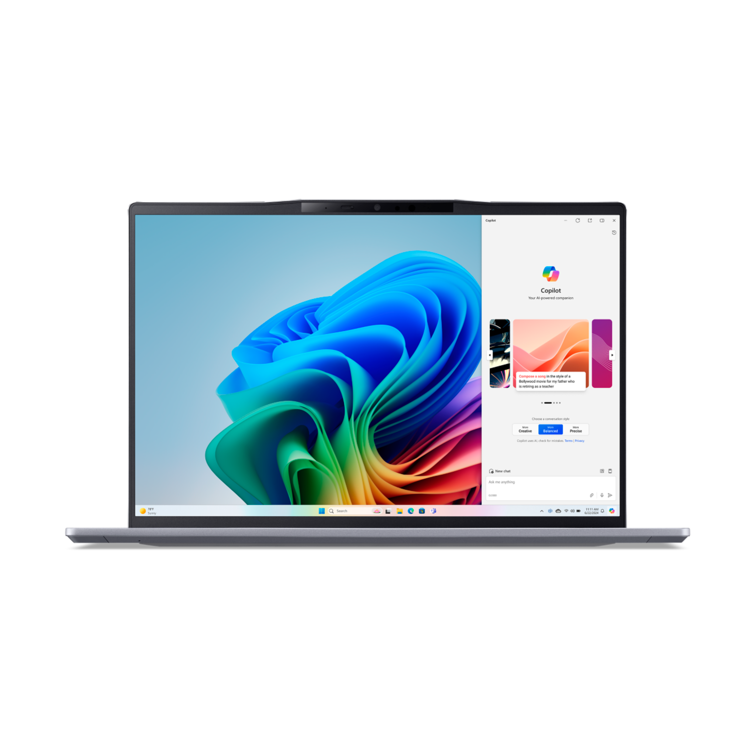 A laptop showing a colorful background and a chat window. The laptop is silver.