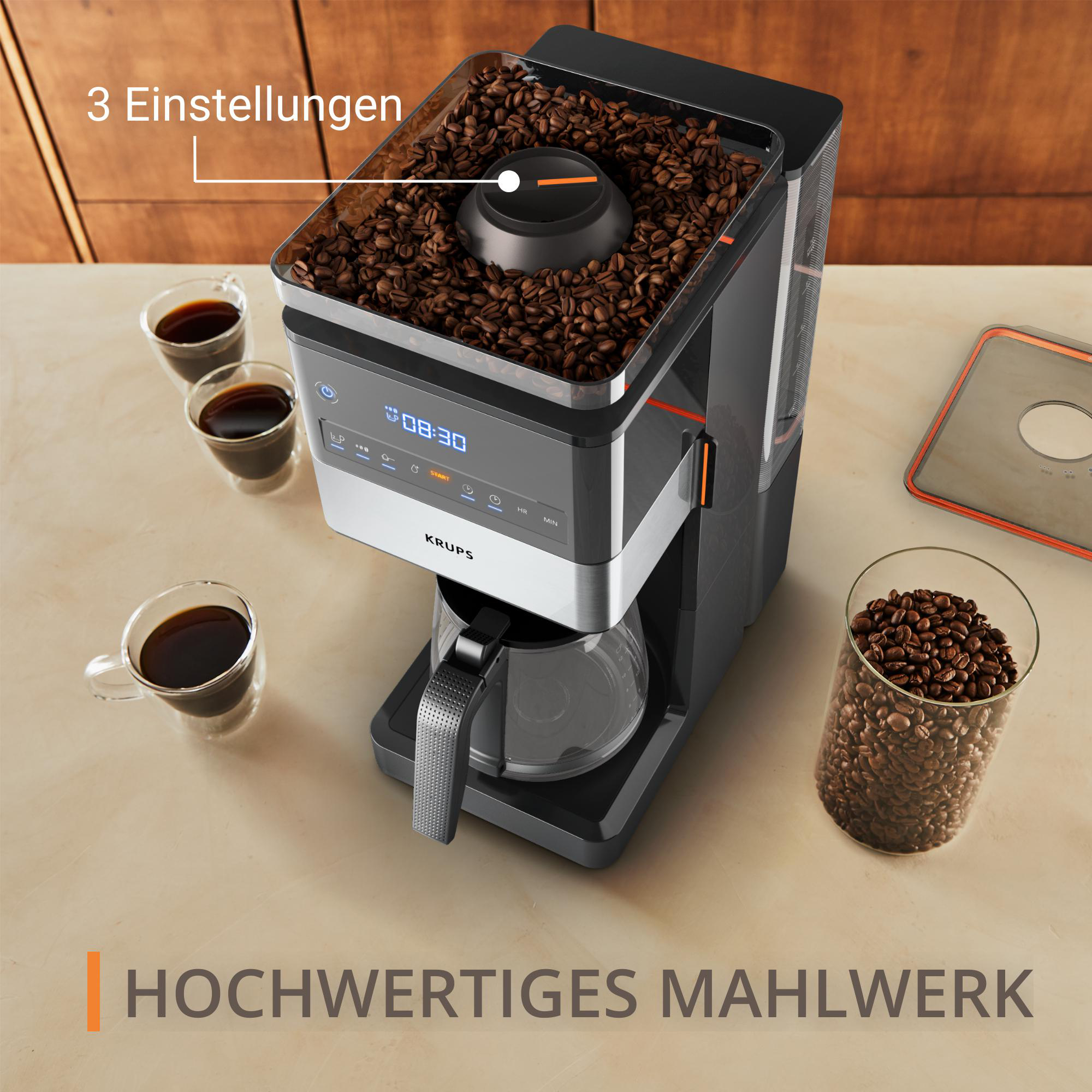 Kaffeemaschine mit Bohnen in transparentem Behälter. Zeigt Kaffeetassen und Text.