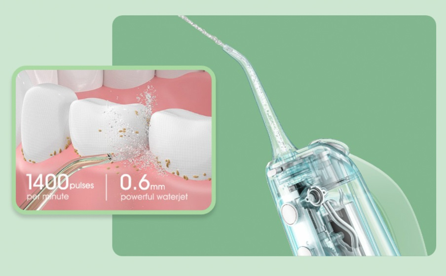 Zbliżenie irygatora dentystycznego, pokazujące czyszczenie zębów z prędkością 1400 impulsów na minutę.