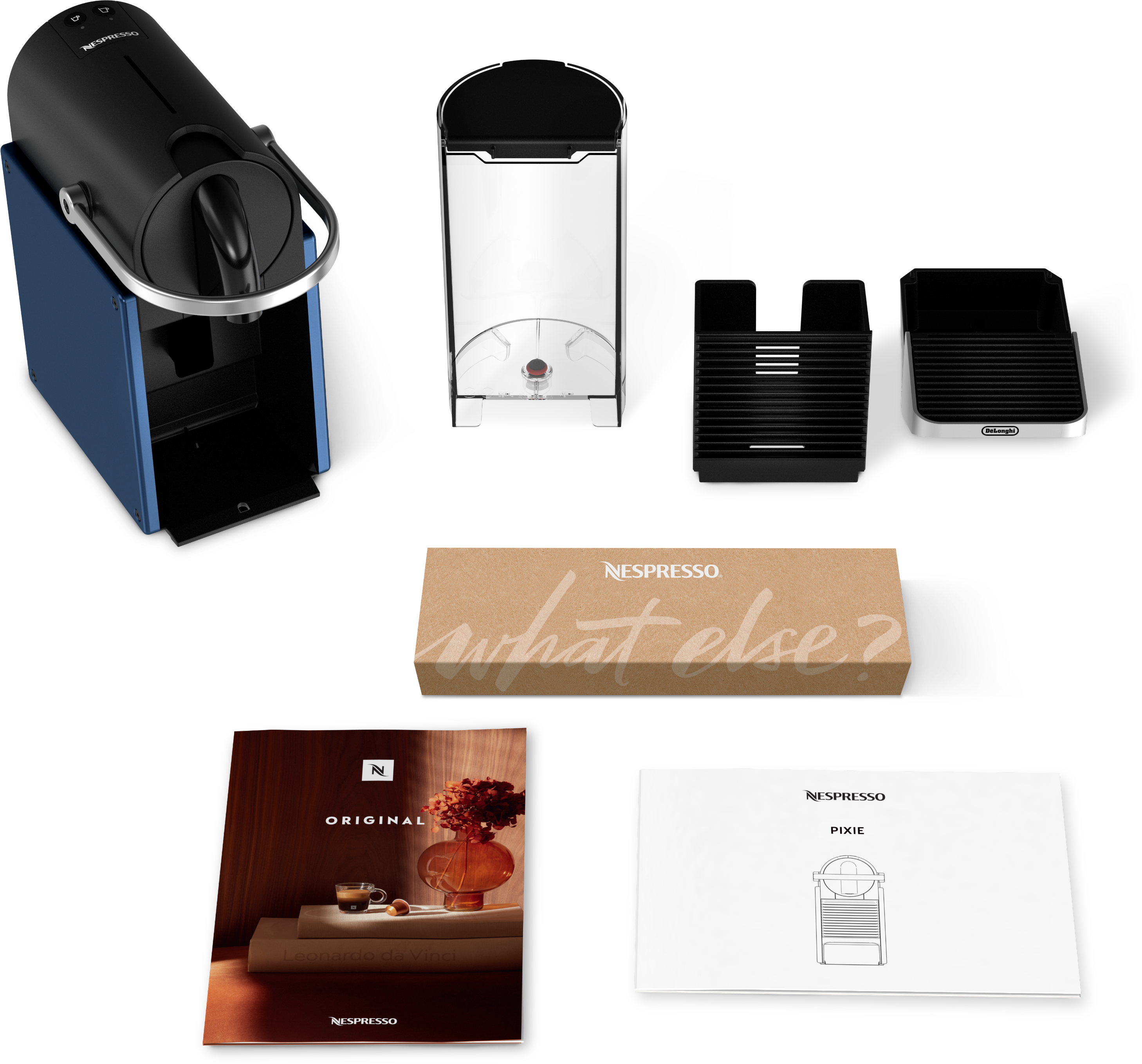 Kaffeemaschine und Zubehör: Nespresso-Maschine, Kapseln, Karton und Handbücher.