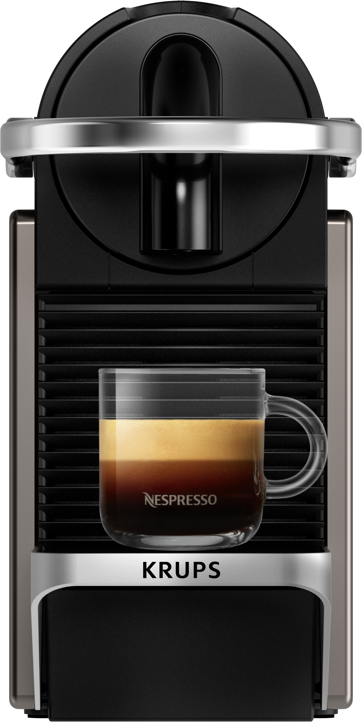 Una macchina da caffè Nespresso con una tazza di caffè di vetro davanti.