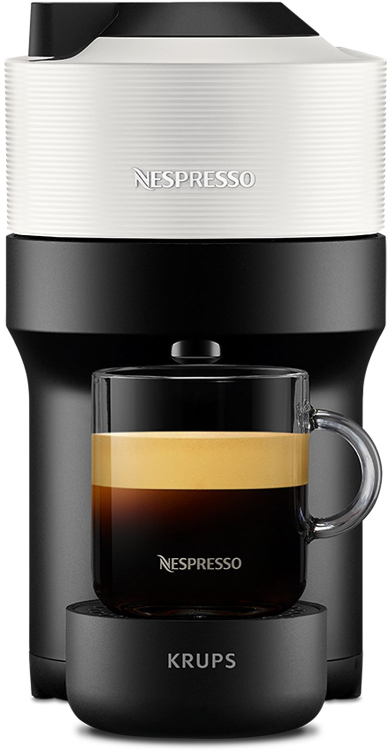 Una macchina da caffè Nespresso con un bicchiere di espresso e crema.