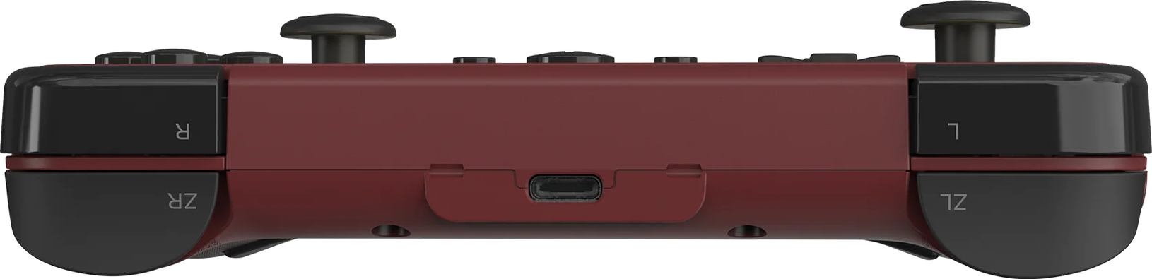 Un controller di gioco bordeaux. Il controller è visto dal lato inferiore.