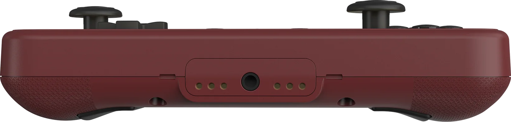 Un controller di gioco bordeaux con joystick e pulsanti neri. Ha una porta in basso.