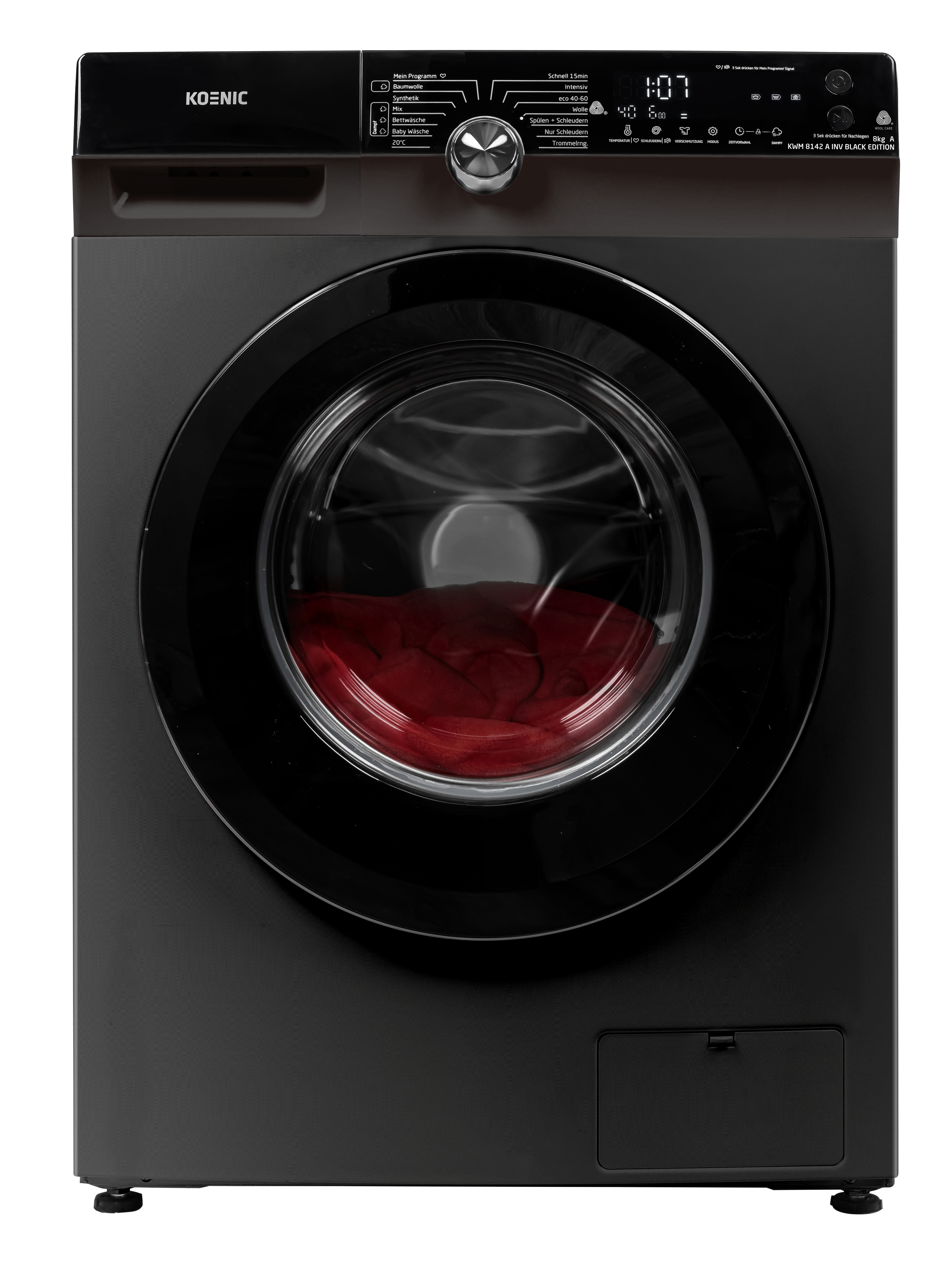 Eine schwarze Koenic Waschmaschine. Die Tür ist schwarz, und die Trommel enthält rote Kleidung.