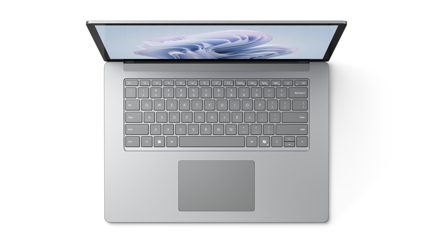 Ordenador portátil abierto sobre fondo negro. El teclado es gris claro y la pantalla muestra un diseño azul y blanco.