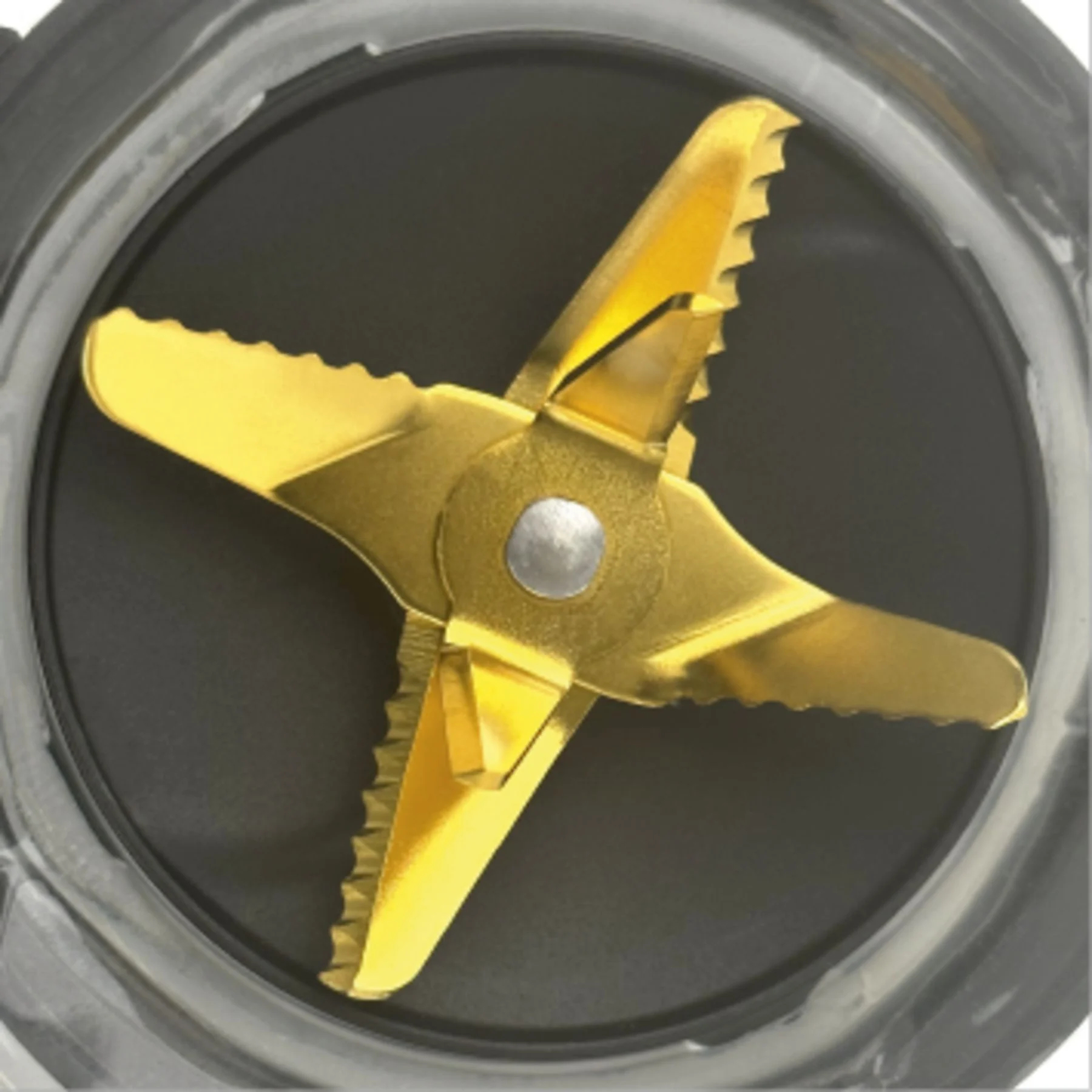 Ostrza blendera, złote, kątowe, czteroramienna gwiazda, na ciemnoszarej podstawie.