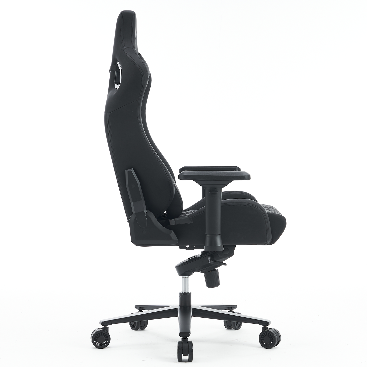 Side view of a black gaming chair with a white background.
