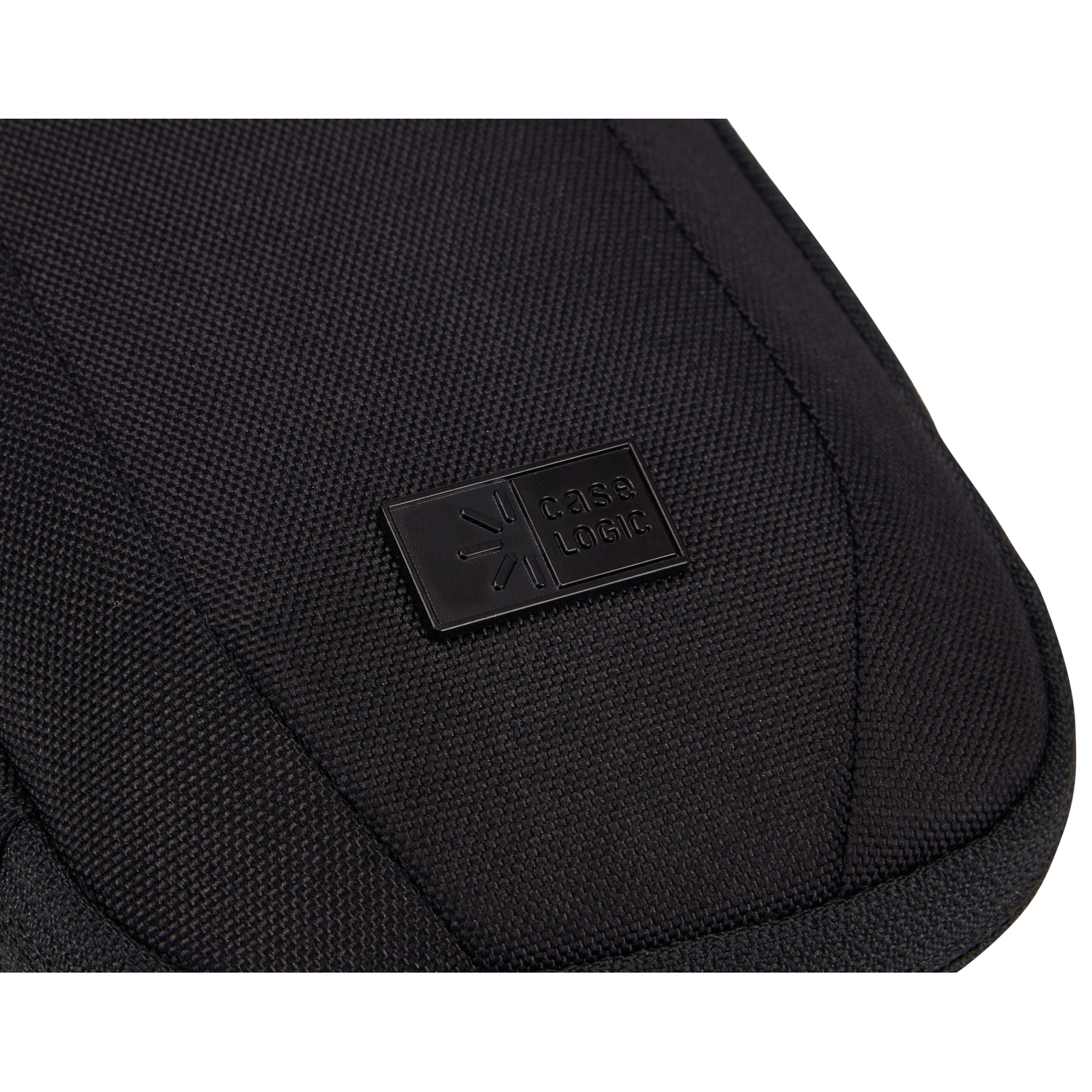 A close-up of a black Case Logic bag, with a black emblem on the front. The bag has a textured surface.