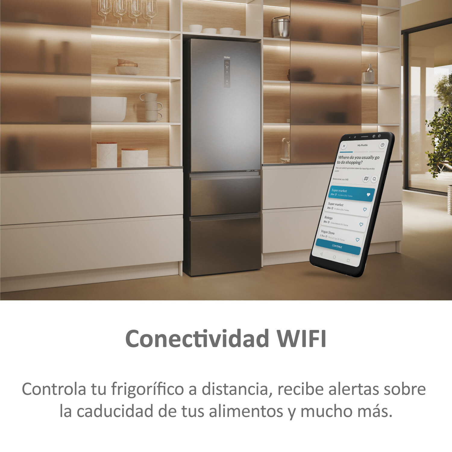 Refrigerador moderno con smartphone mostrando app de compras, etiquetado como Conectividad WIFI.