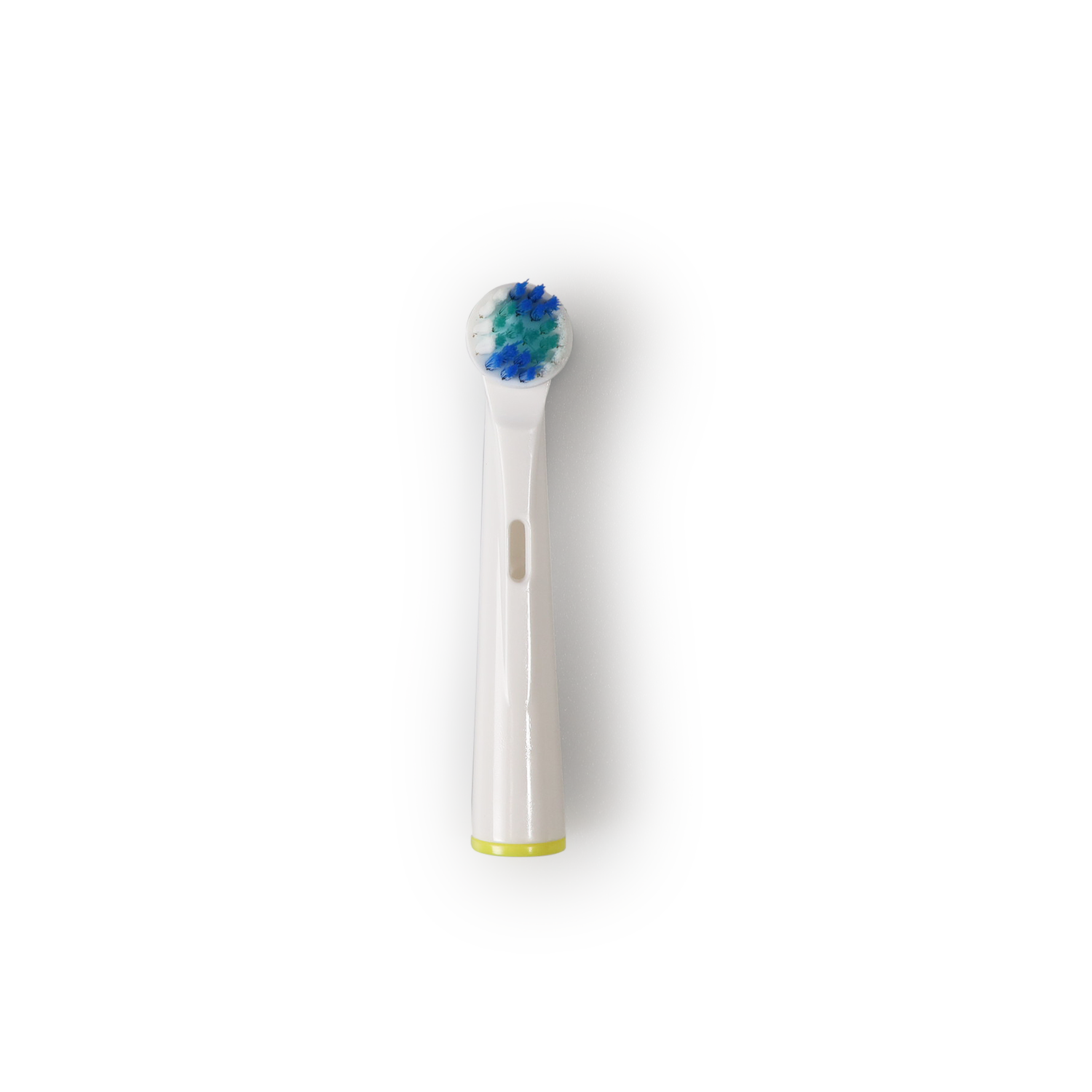 A white toothbrush head with blue and green bristles, viewed from above, isolated on a white background.