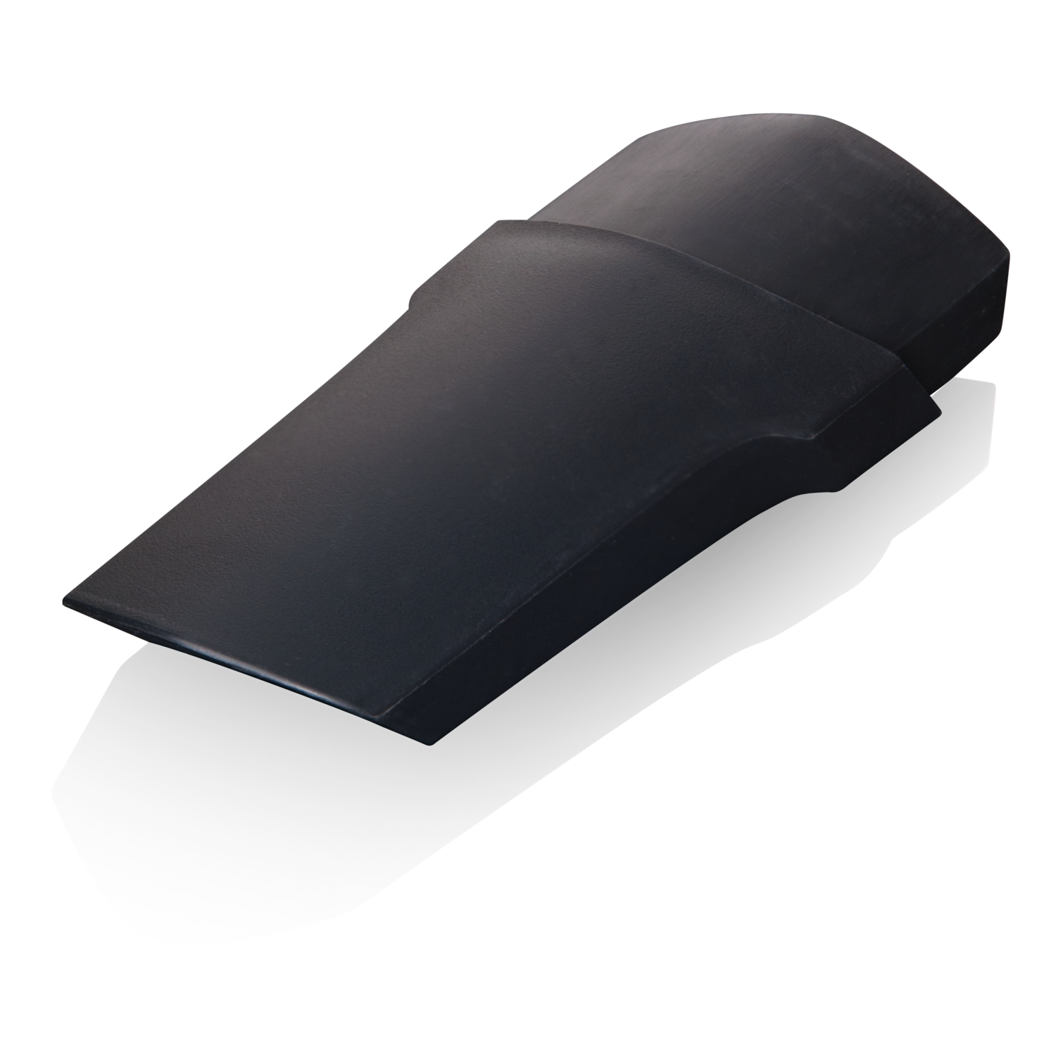 A black, angled, plastic object on a black background, casting a shadow.