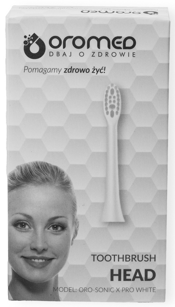 Pudełko z główką szczoteczki do zębów, twarzą kobiety, tekstem na szarym tle plastra miodu.