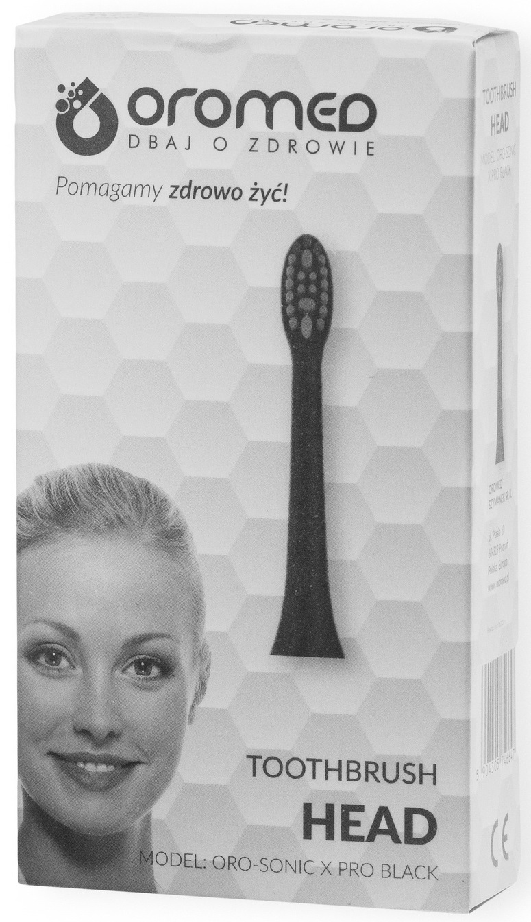 Główka szczoteczki do zębów w pudełku. Przedstawia twarz kobiety i nazwę produktu.