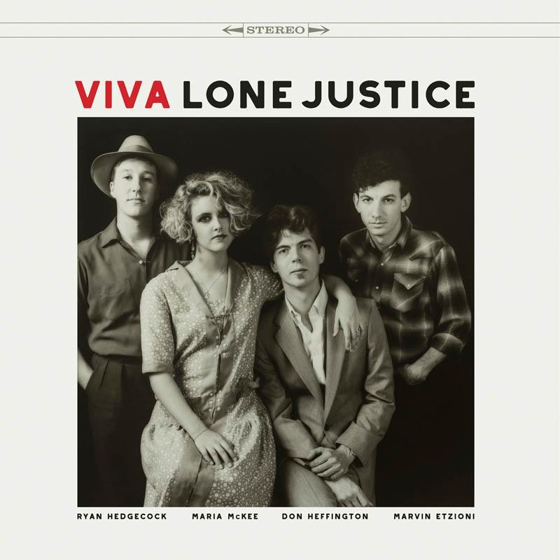 Schwarz-Weiß-Foto einer Band, Viva Lone Justice. Vier Personen in verschiedenen Stilen, Bandname oben.