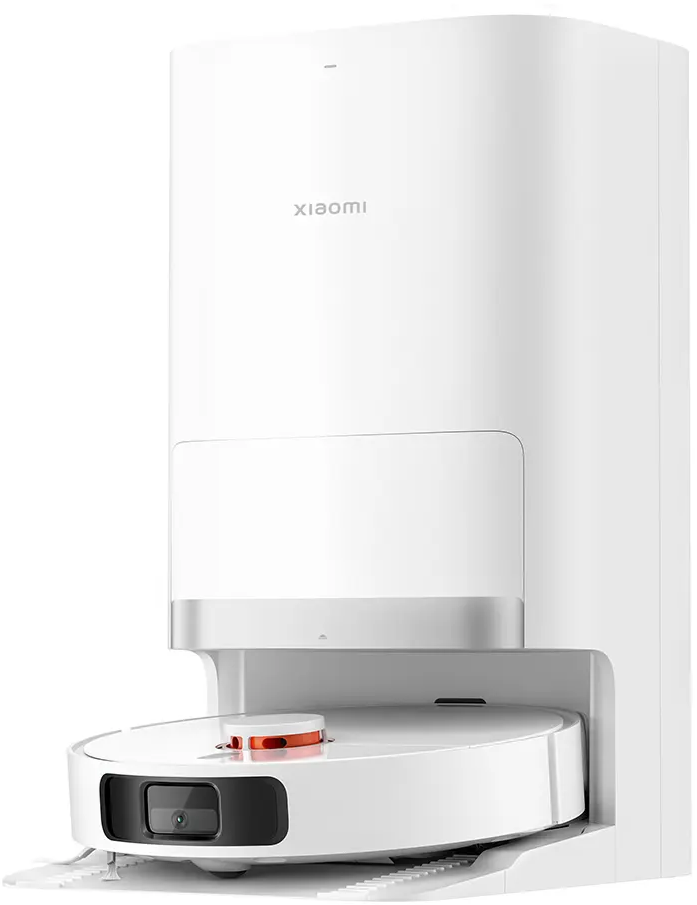 Station de nettoyage blanche avec un robot aspirateur. L'aspirateur est blanc et rond.