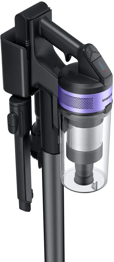 Gros plan d'un aspirateur sans fil Samsung avec un accent violet et un bac à poussière transparent.