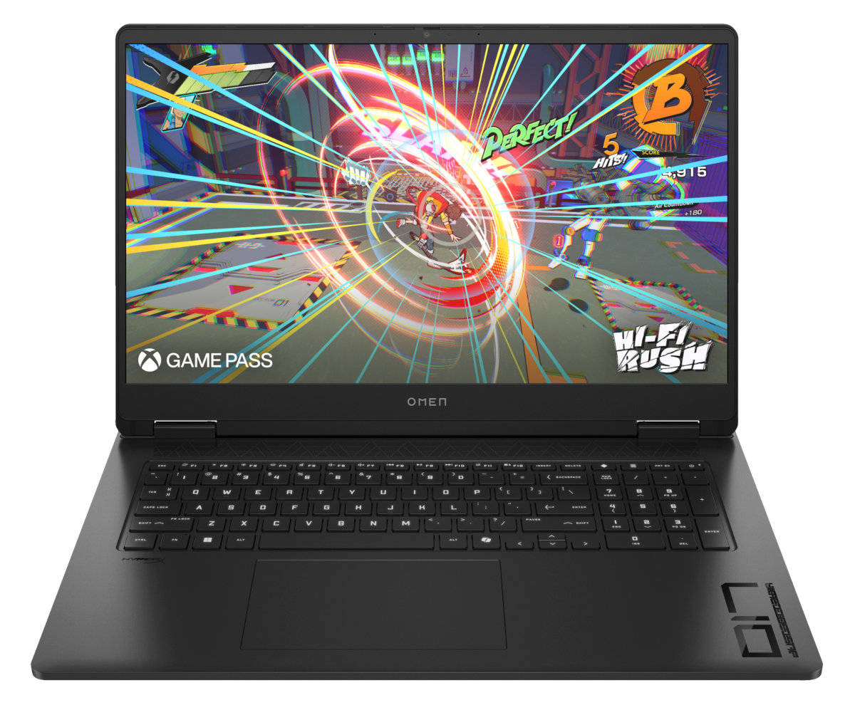 Czarny laptop wyświetlający żywą grę wideo. Ekran pokazuje scenę wyścigów.