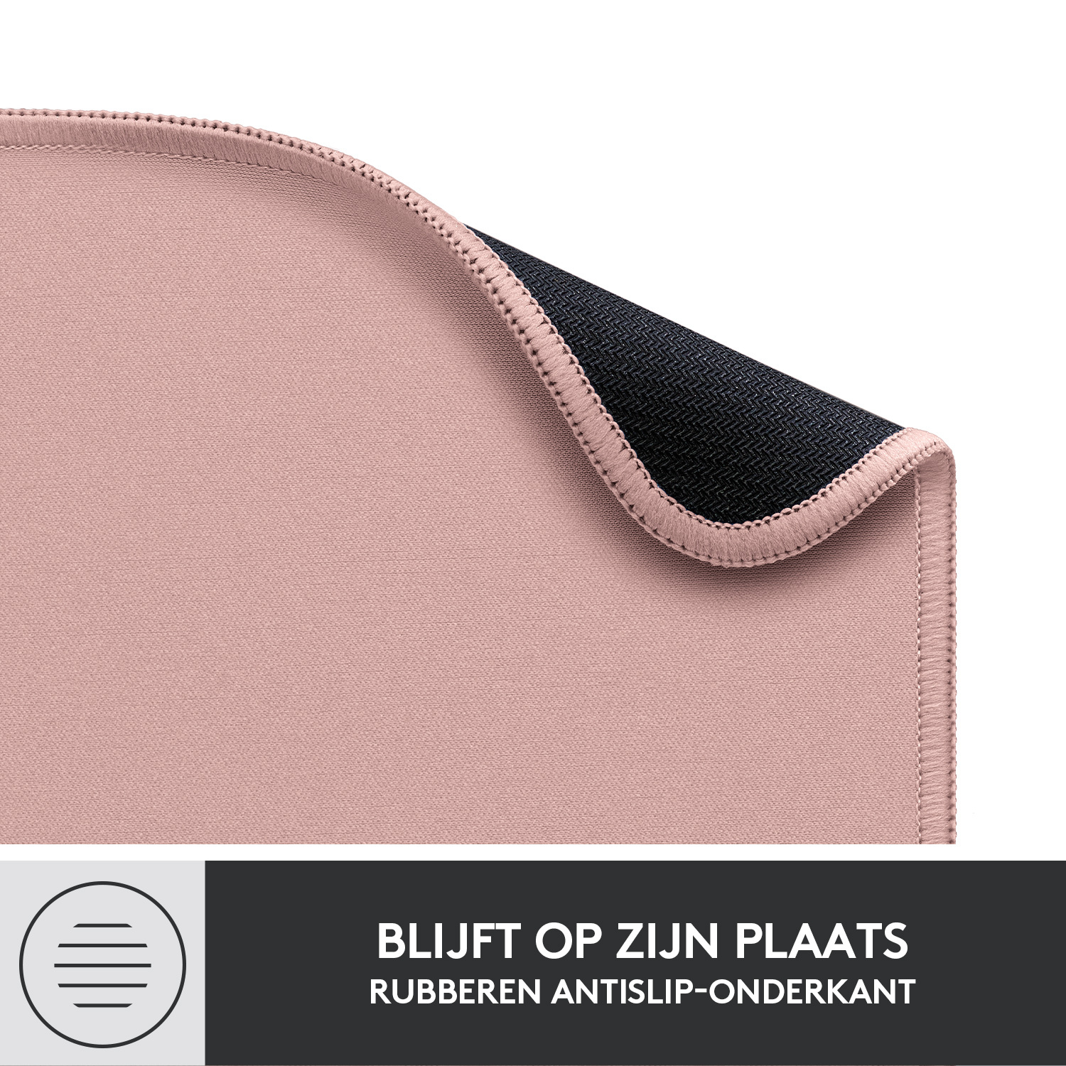 Close-up van een roze muismat met een gestructureerd oppervlak en een zwarte antislipbasis.