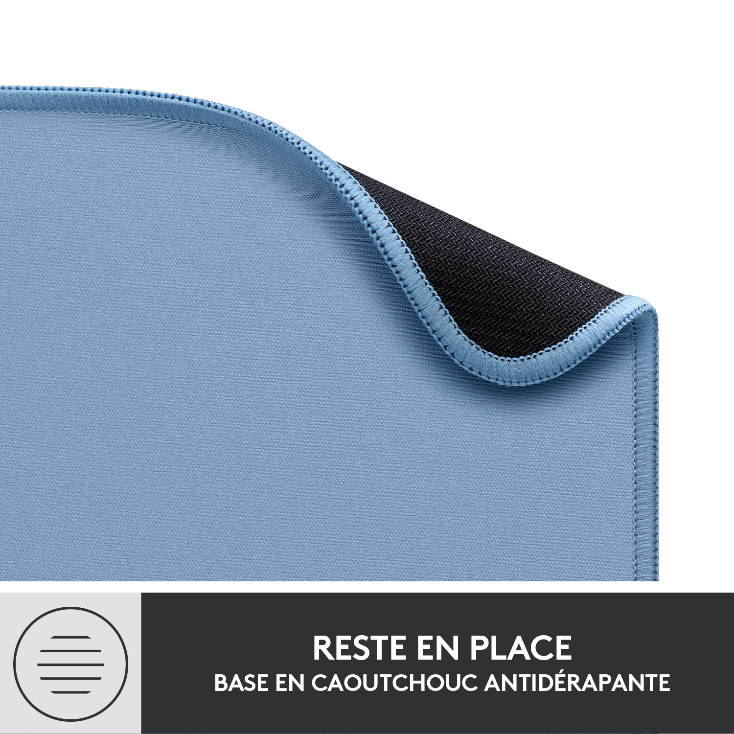 Tapis de souris bleu avec dessous noir. Texte : Reste en place Base en caoutchouc antidérapante.