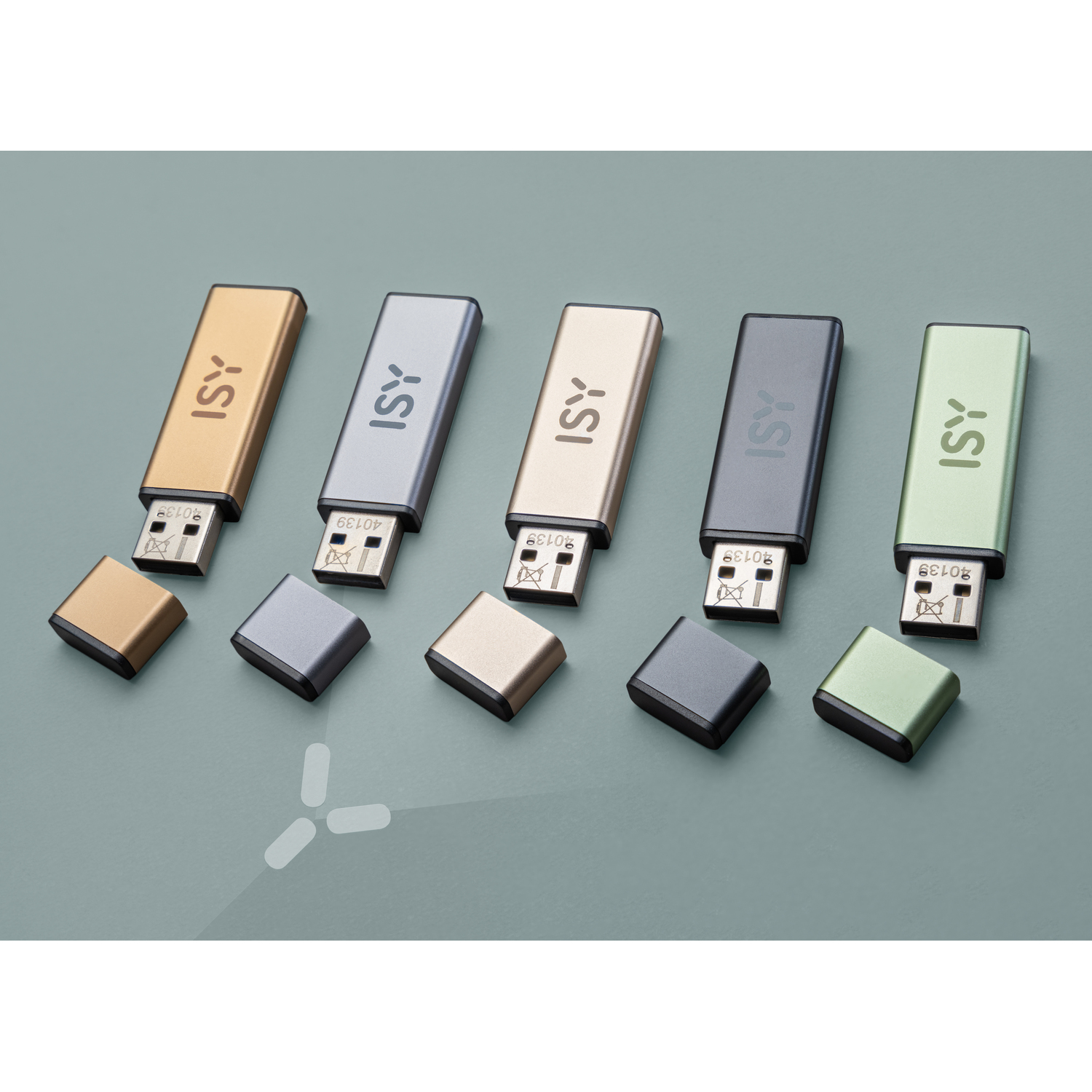 Five USB flash drives in different colors and matching caps.