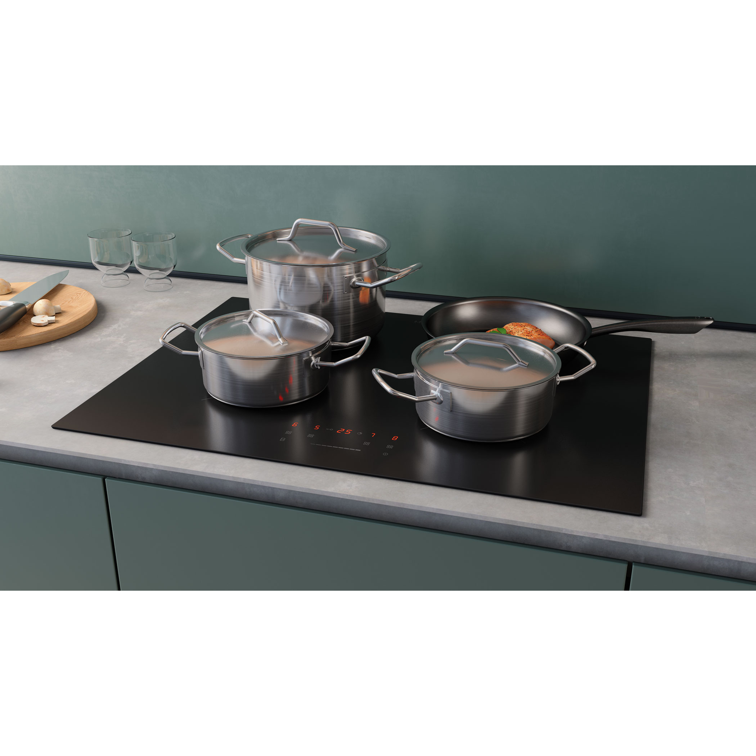 Black hob with three pots and a frying pan on it. The hob has digital controls.