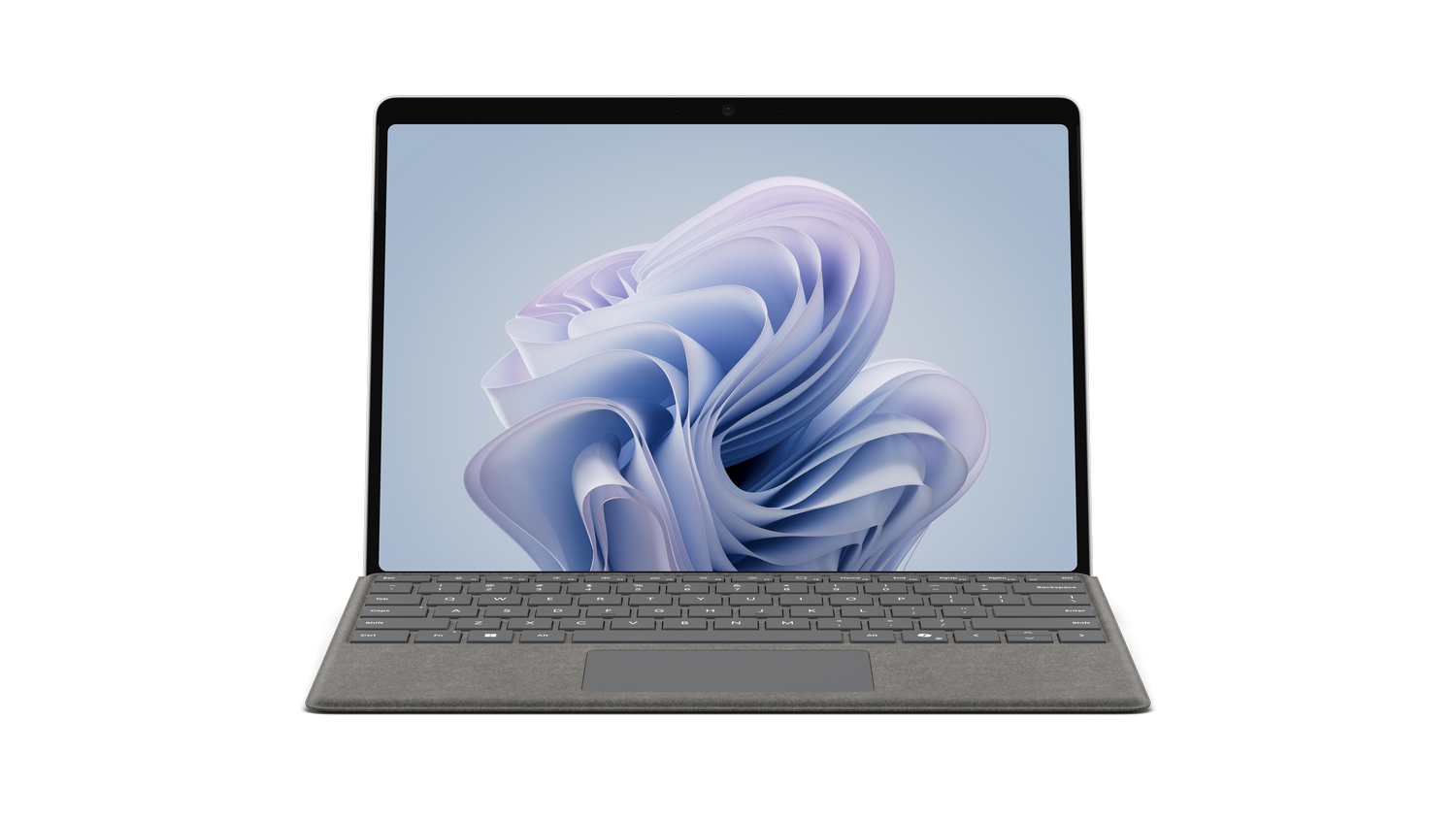 Una computadora portátil con un teclado gris y una pantalla que muestra una imagen borrosa y abstracta.