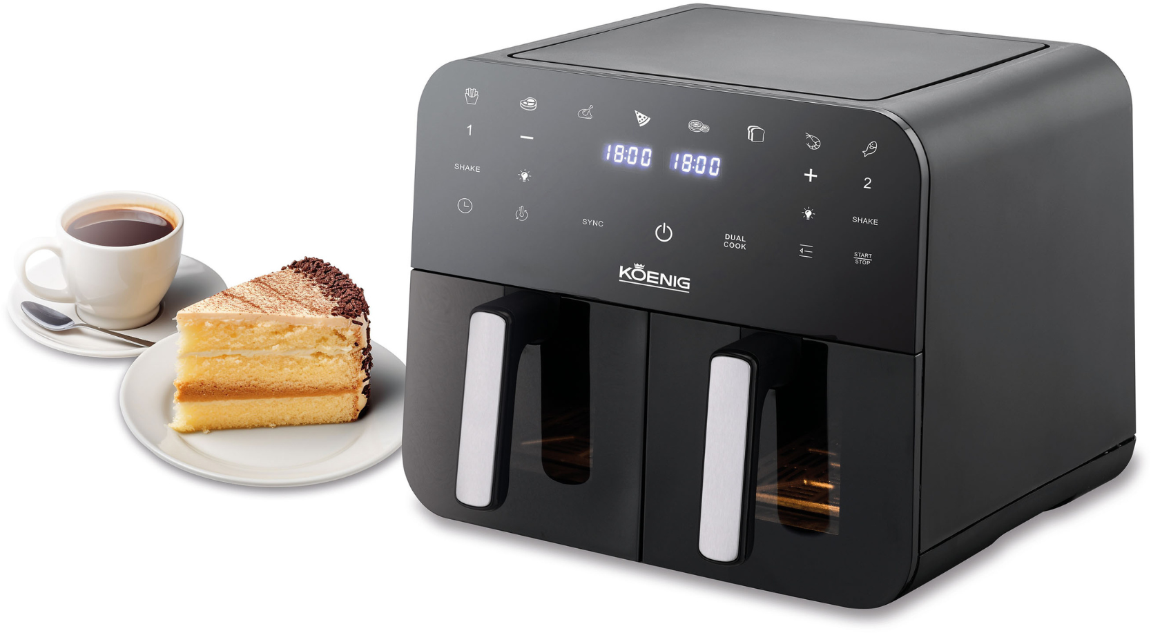 Schwarze Heißluftfritteuse mit Kuchen und einer Tasse Kaffee links. Weißer Hintergrund.