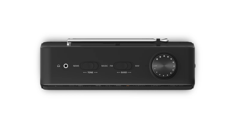 Radio negro desde arriba. Tiene botones para Noticias, Música, FM, MW y un dial de volumen.