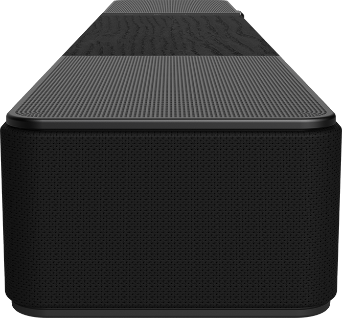 Langer schwarzer Soundbar in Nahaufnahme mit Textur auf der Oberseite.