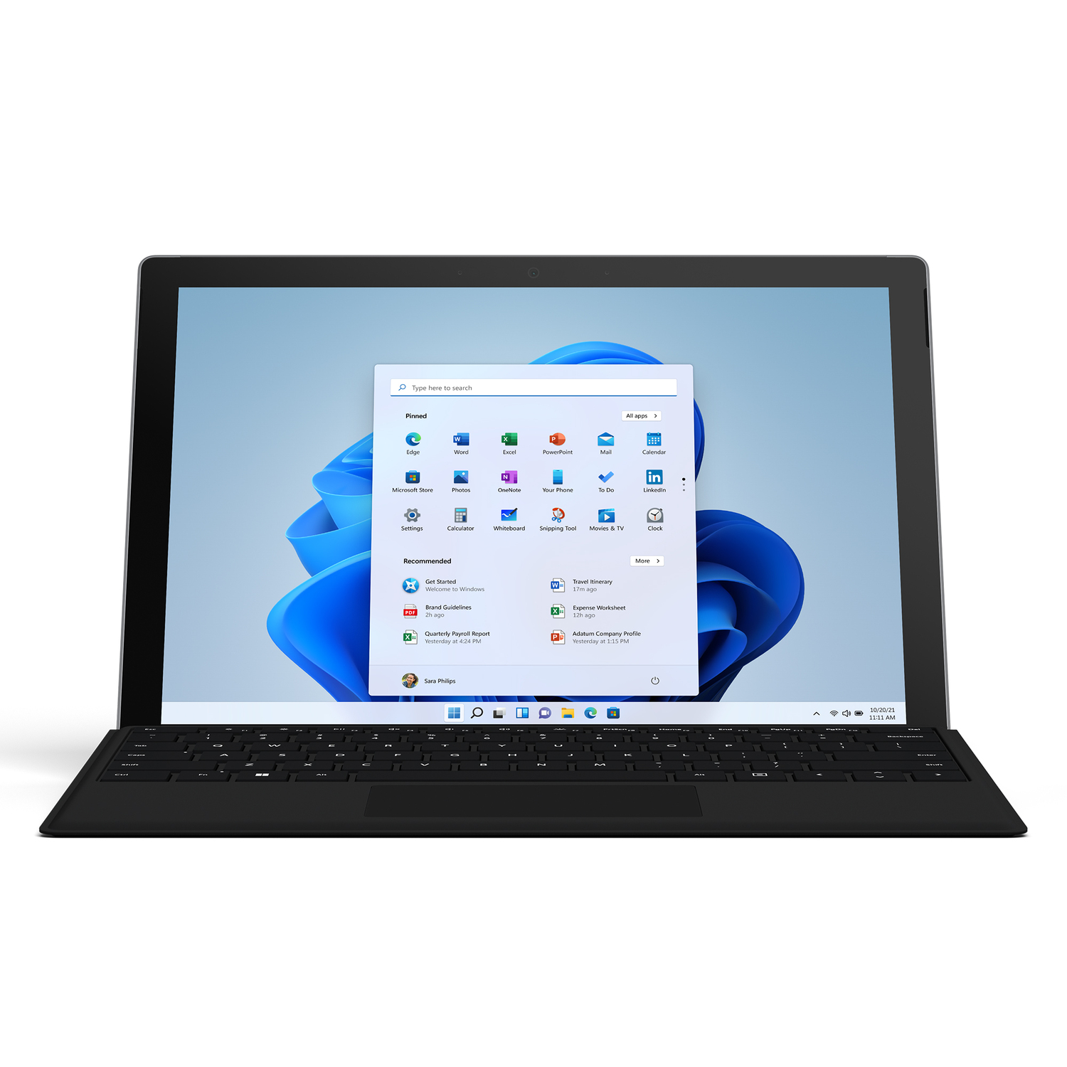 A black laptop with Windows 11 interface open, on a white surface.