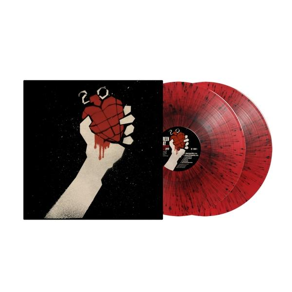 Pochette de l'album '21st Century Breakdown' de Green Day. Montre une main tenant un cœur brisé avec du sang.