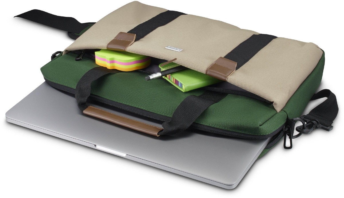 Laptop, karteczki samoprzylepne i długopis w zielono-beżowej torbie.