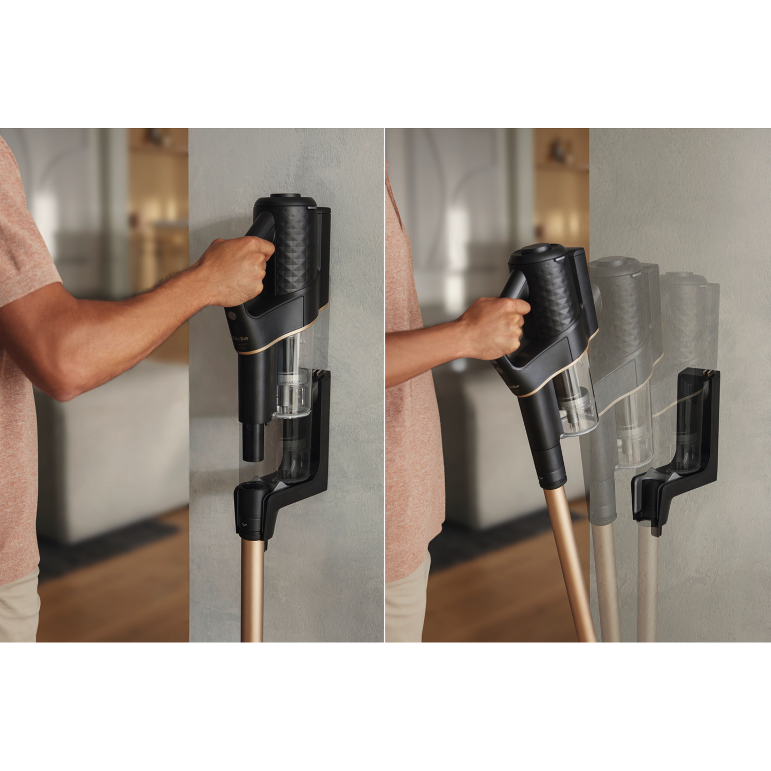A person using a black and gold vacuum cleaner, mounted to a wall.