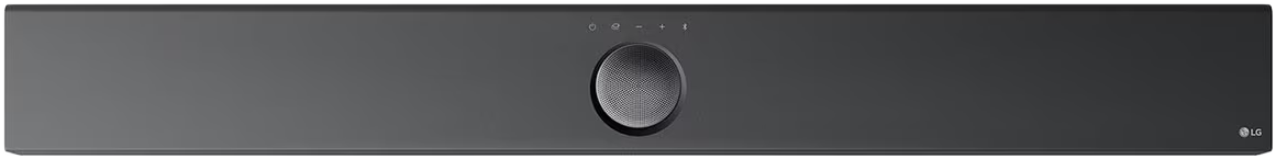 Hosszú, sötétszürke soundbar, központi kerek vezérlővel. A háttér egyszínű fehér.