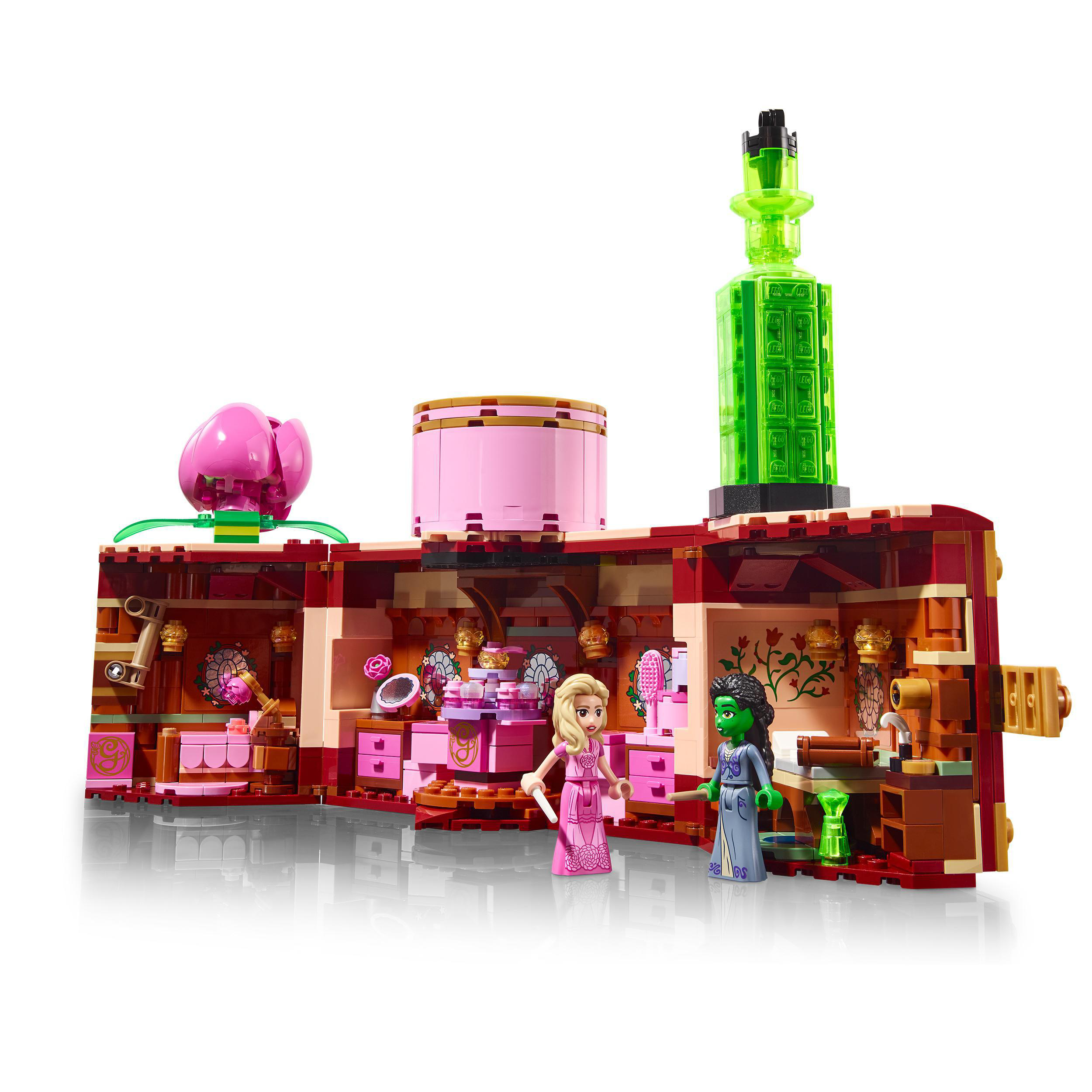 Lego-Set mit zwei Figuren in einer detaillierten Innenszene mit rosa und grünen Akzenten.