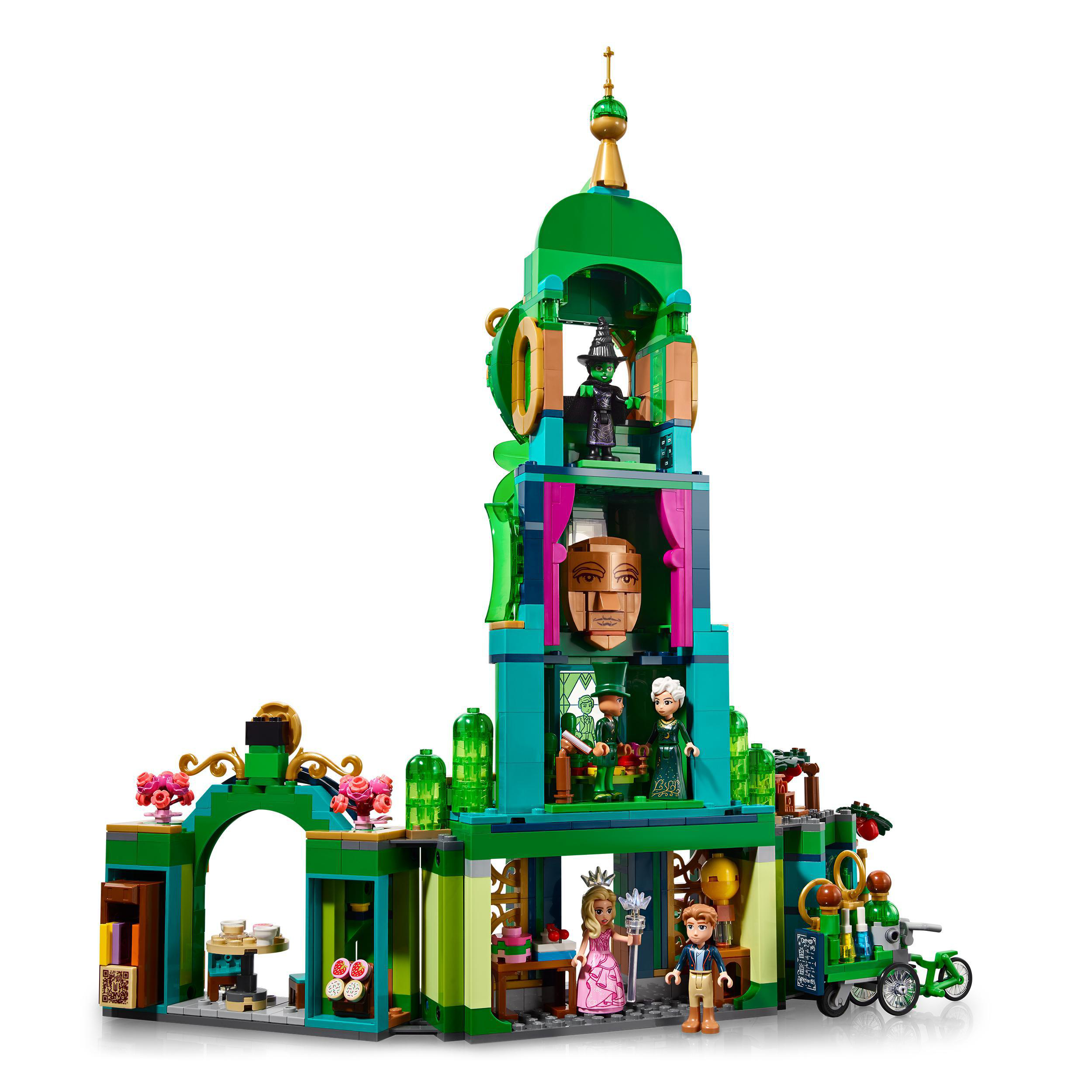 Ein Lego-Set eines hohen grünen Gebäudes mit mehreren Minifiguren und einem kleinen Wagen.