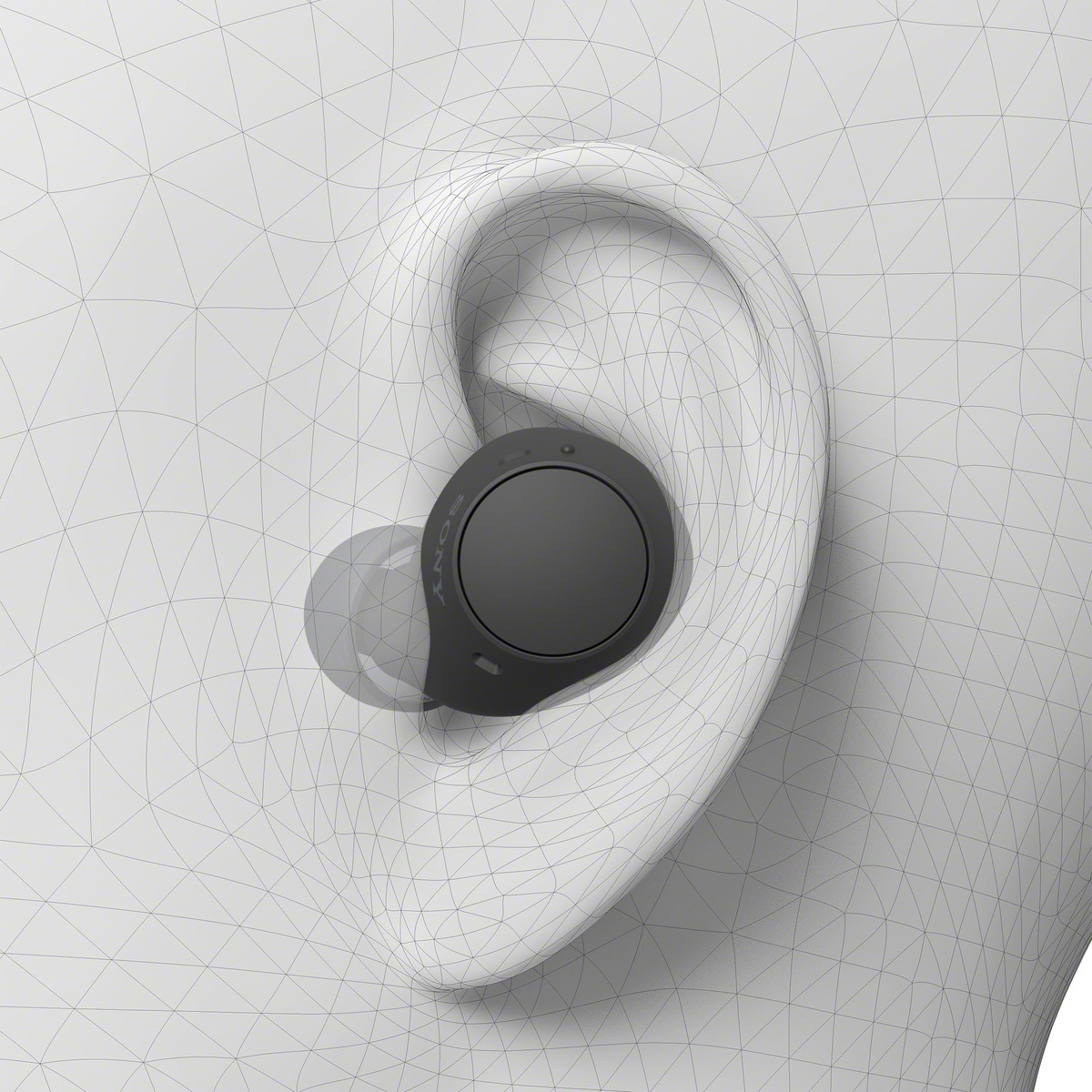 Oreja con auricular gris, primer plano. Una estructura similar a una malla rodea la oreja.