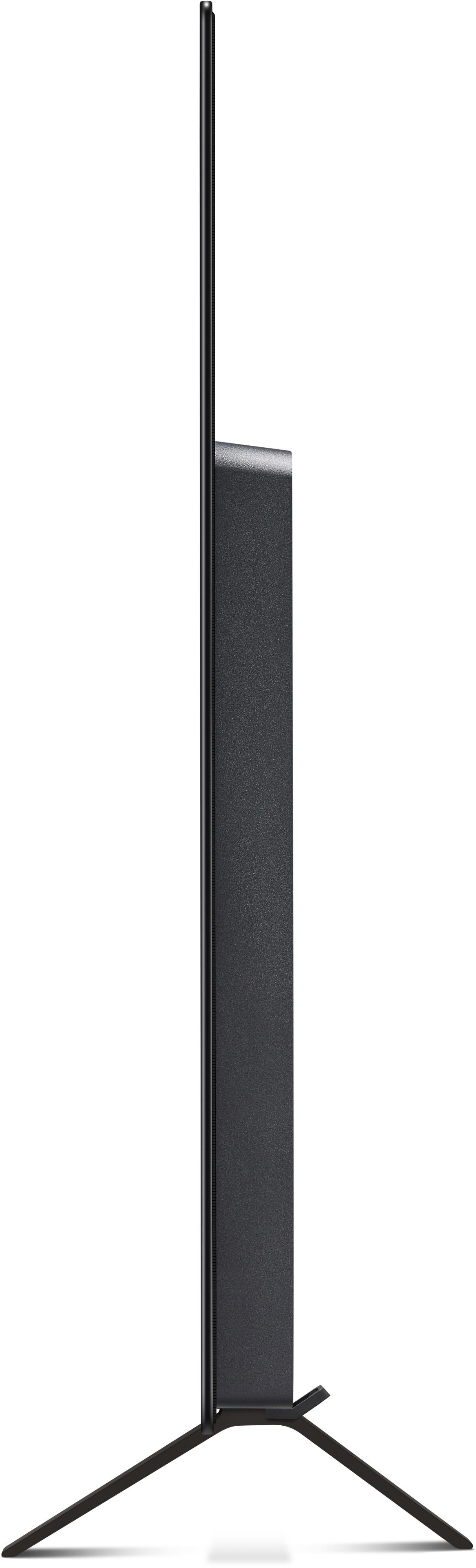 Ein schwarzer Fernseher mit Ständer, von der Seite gesehen, minimalistisches Design.