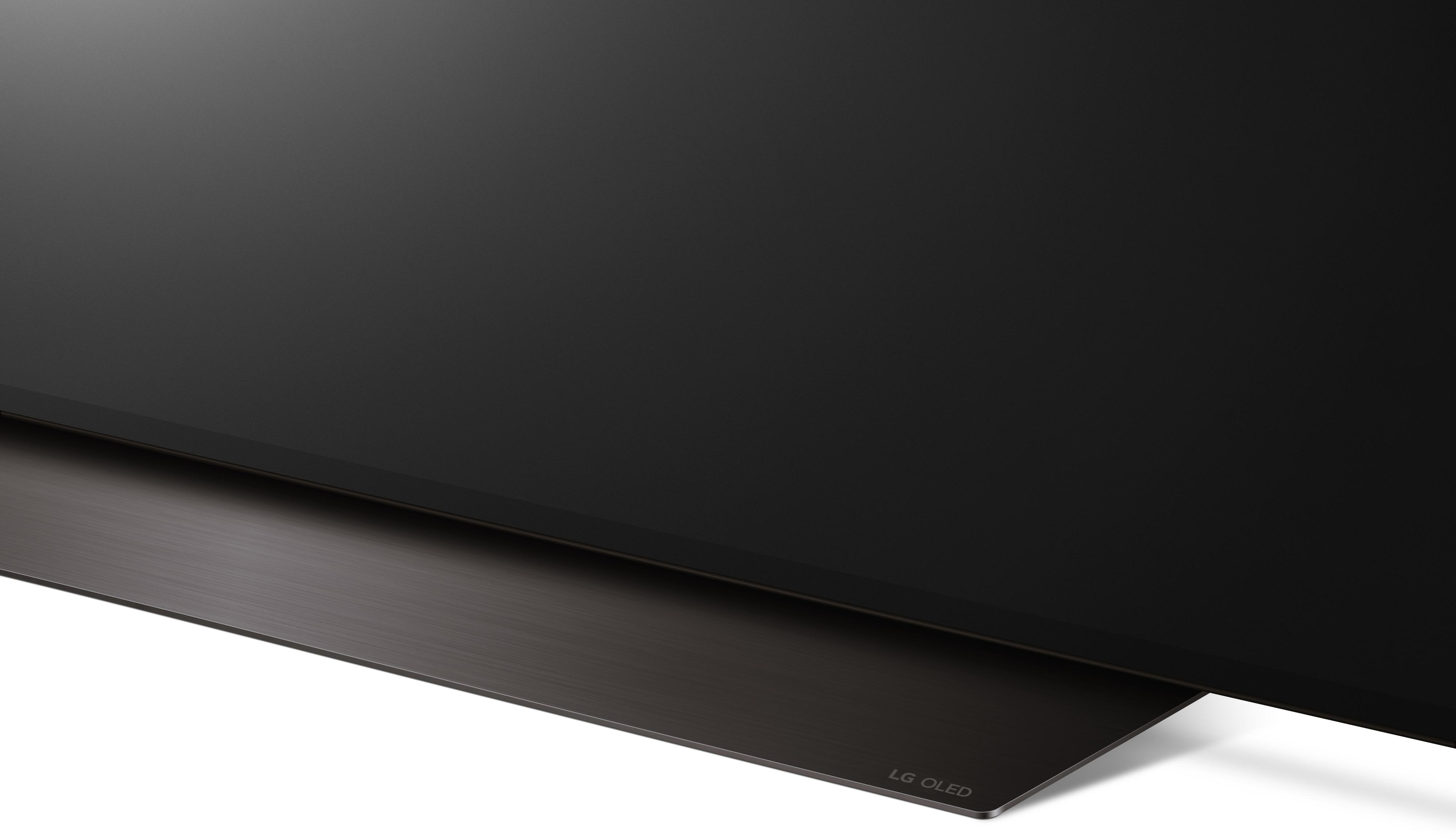 LG OLED TV, Nahaufnahme des Bodens, schwarzer Bildschirm, schwarzer Fuß.